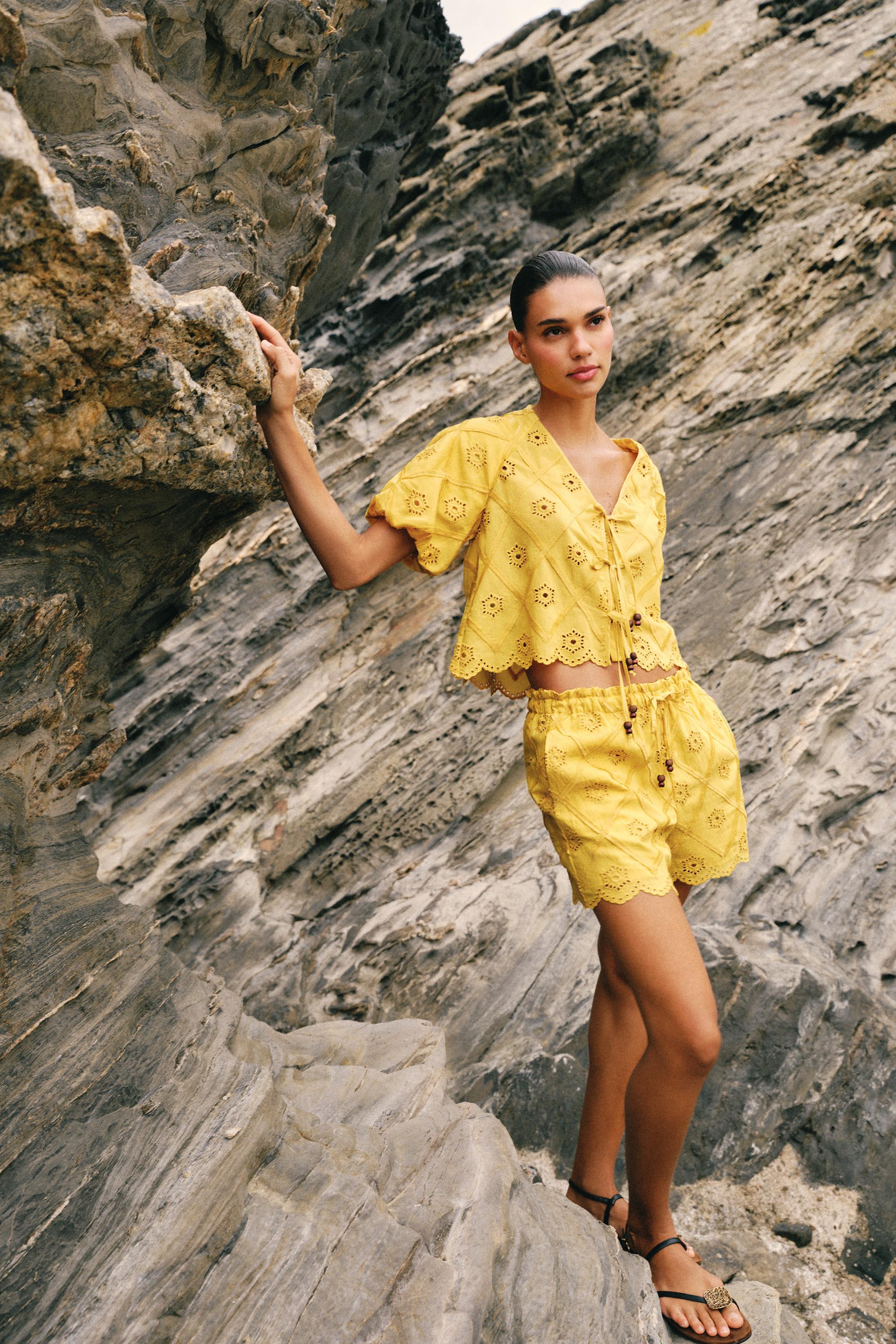 EMBROIDERED EYELET TOP